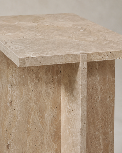 CANOVA natural beige travertine side table by DEKATO LIVING isolated on a white background