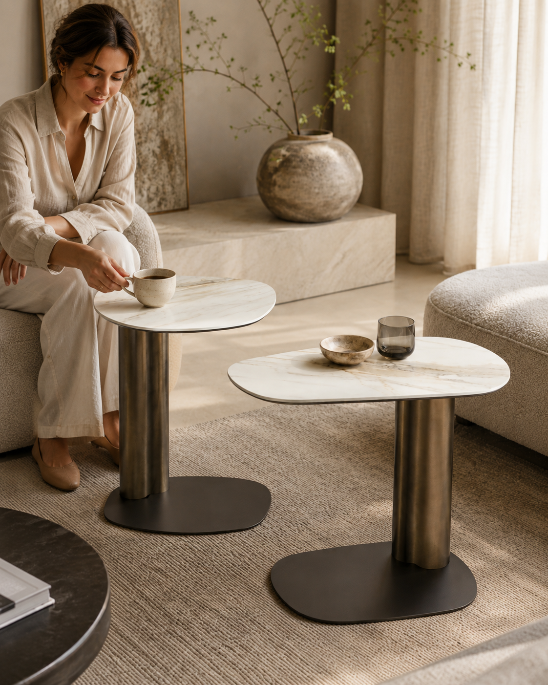 KAVO ceramic side tables by DEKATO LIVING with a woman enjoying coffee in a refined living room