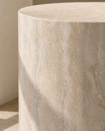 Material detail of ORLO beige natural travertine side table by DEKATO LIVING highlighting pores and mineral texture