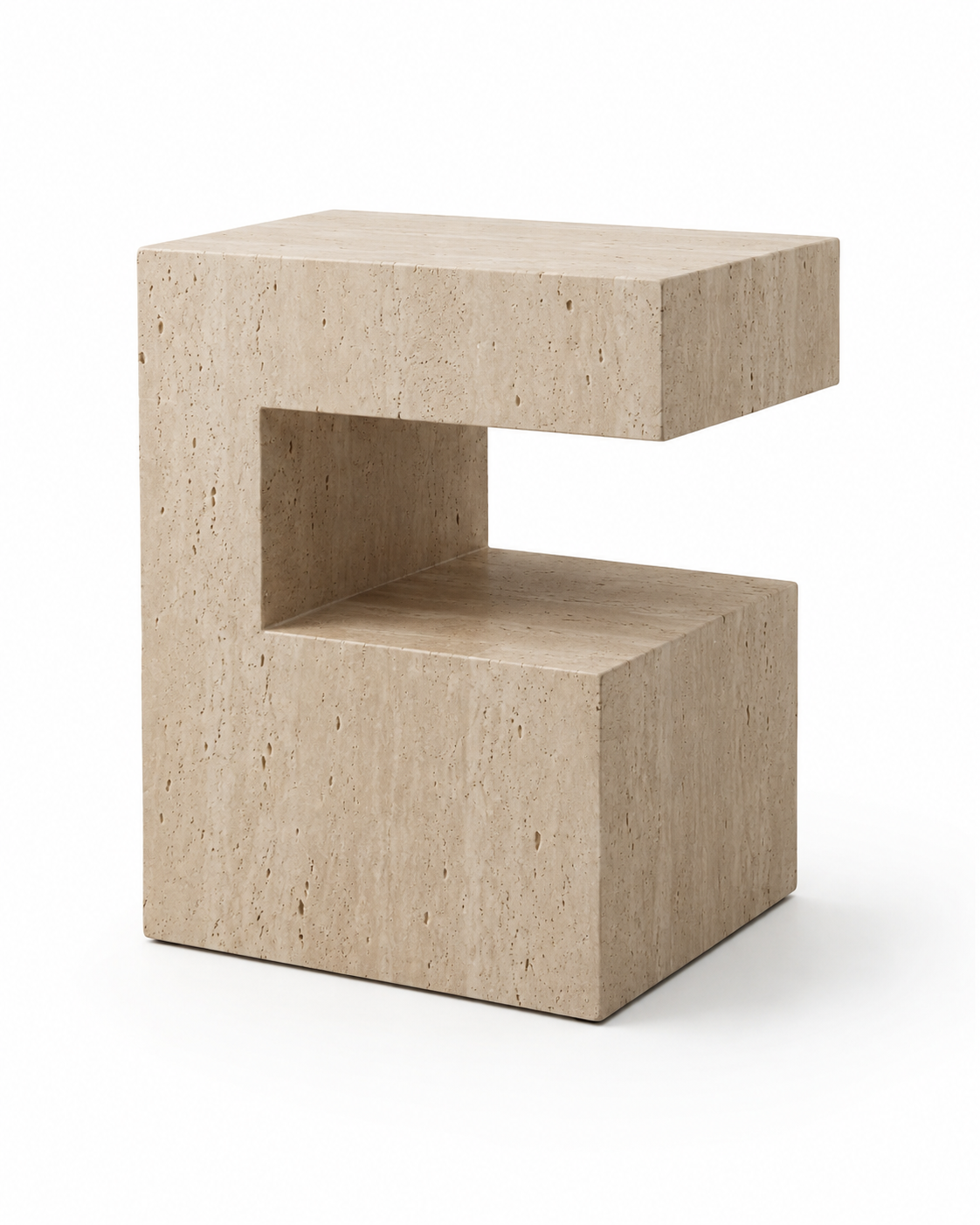 PIETRA beige travertine side table by DEKATO LIVING styled with books and a vase in a calm contemporary interior