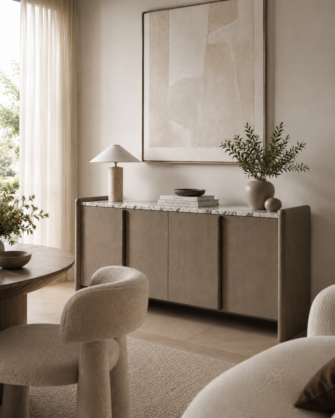 VERO sideboard by DEKATO LIVING with a woman styling the marble top in a softly lit dining interior