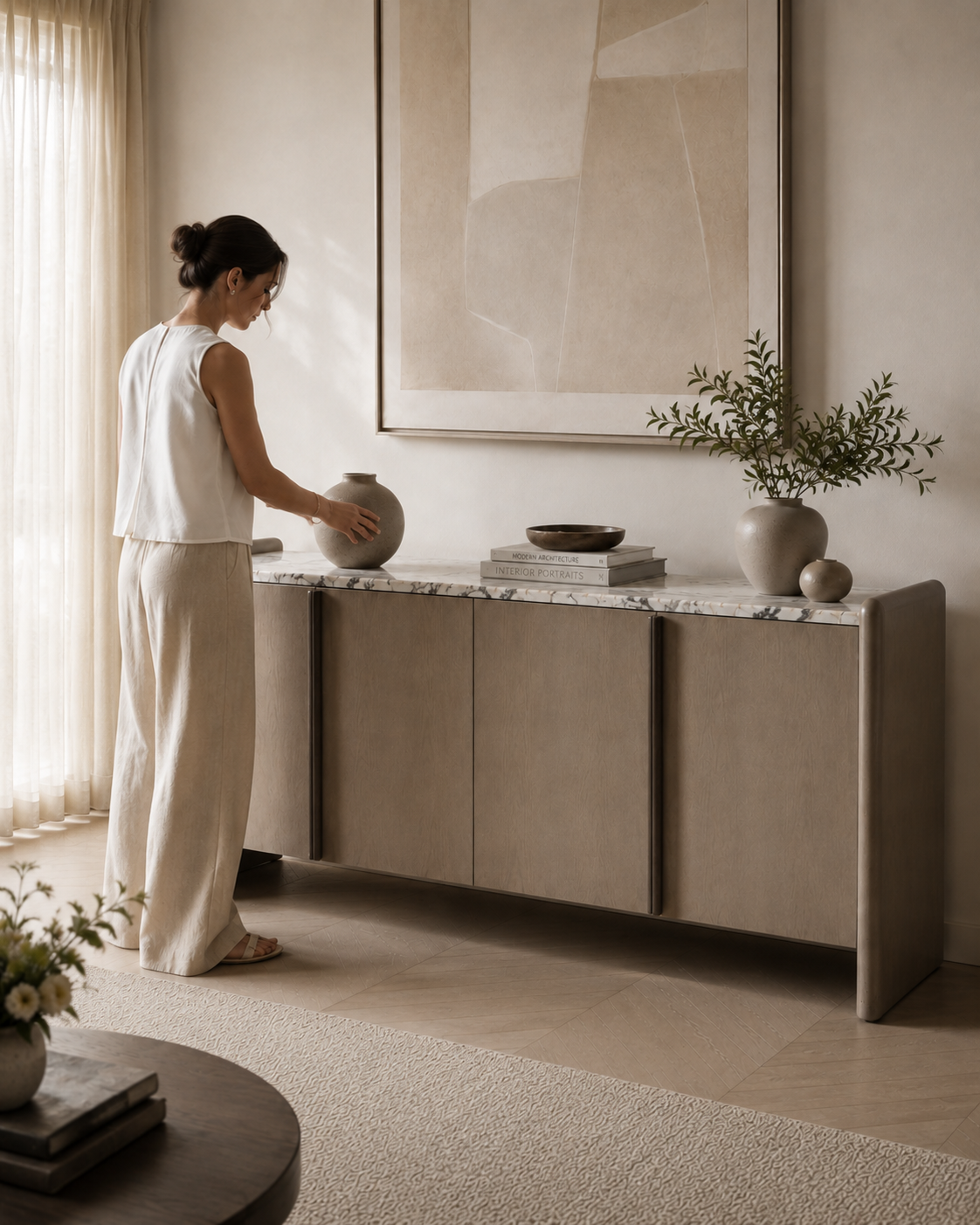 Close-up of VERO sideboard by DEKATO LIVING showing the natural marble top, rounded side panel and wood veneer doors