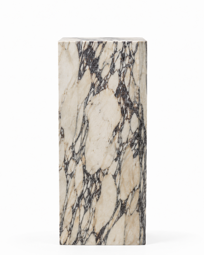VIOLA natural Calacatta Viola marble display plinth by DEKATO LIVING on a white studio background